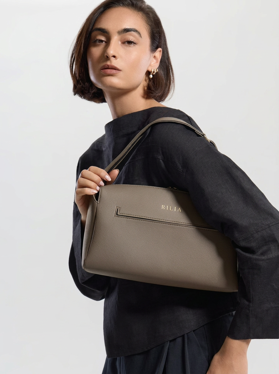 Als Schultertasche